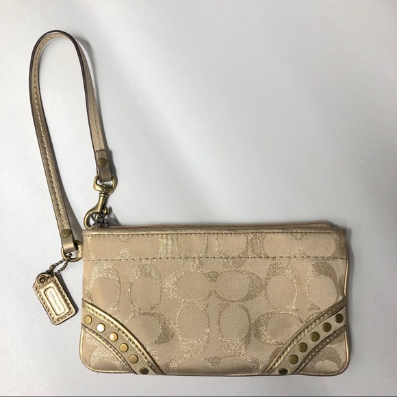 Coach Handbags - Authentic Coach Studded Gold Logo Wristlet